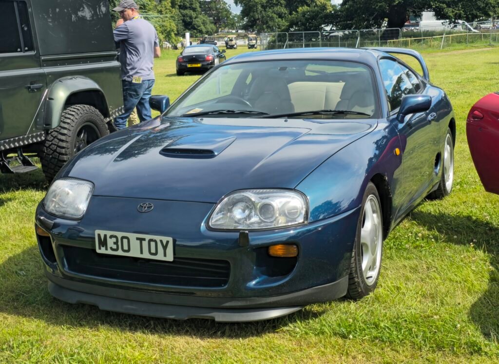 A blue toyota supra mk4