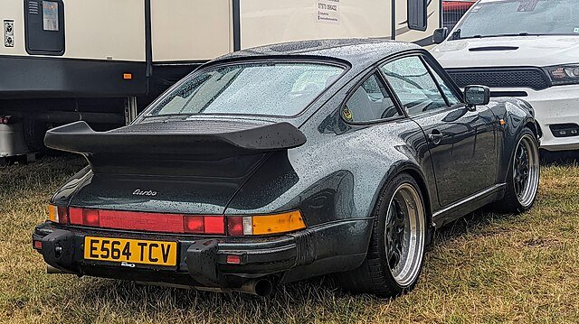 A black Porsche 930 turbo 