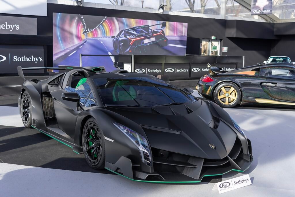 A black and green Lamborghini Veneno Roadster