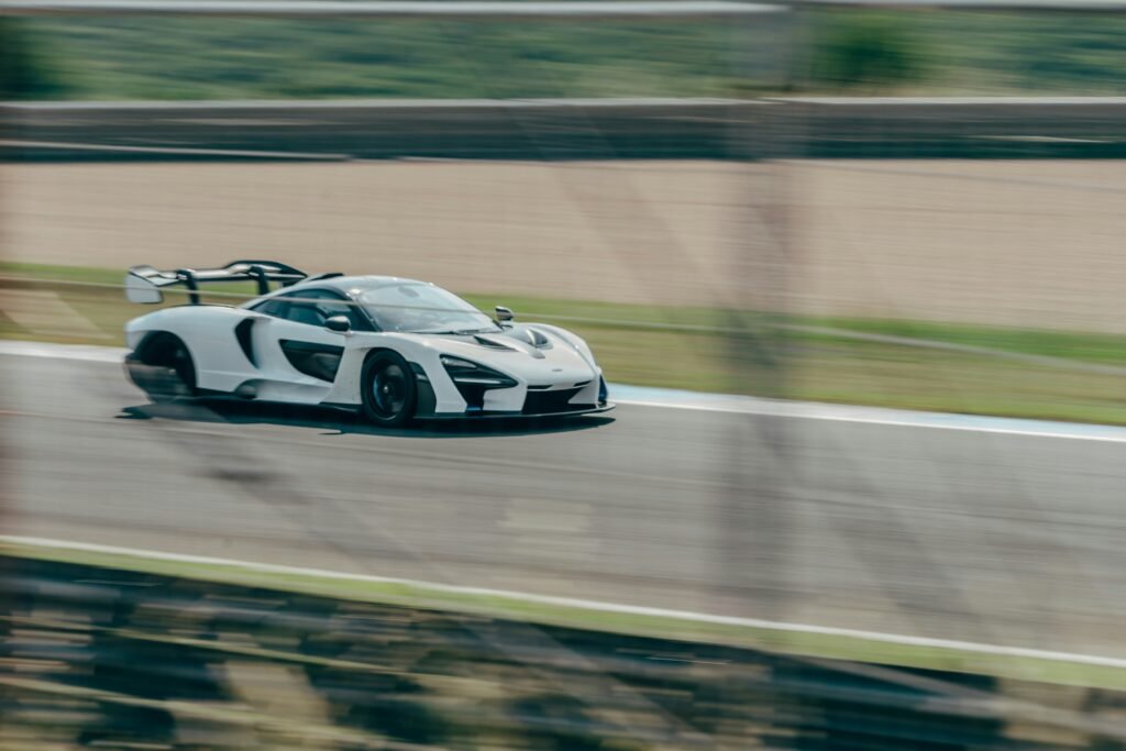 A white mclaren senna on the track